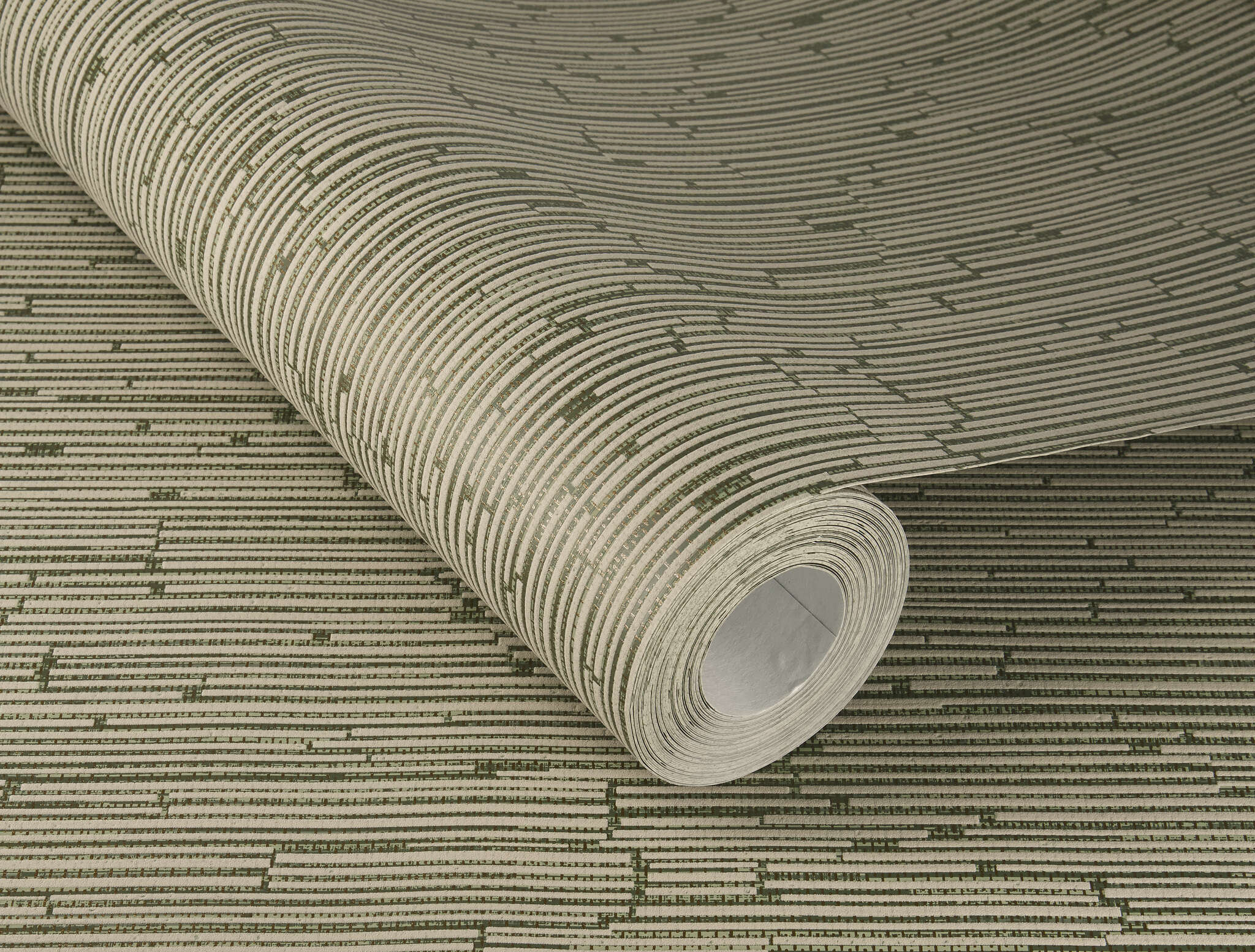 10-312645 Detailaufnahmen 1 Detailed image of Olive green non-woven wallpaper with pronounced vertical lines and a slight depth effect