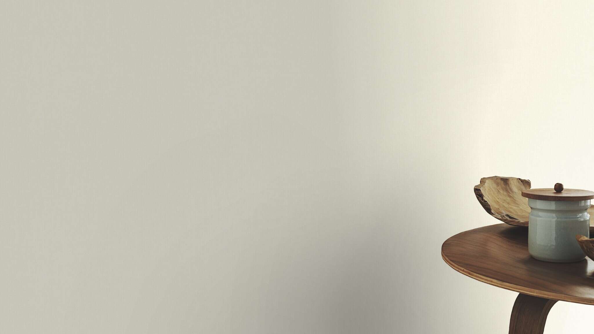 10-424034 Raumsituationen 1 Room with Plain non-woven wallpaper in a light vanilla shade with a textile-like surface.