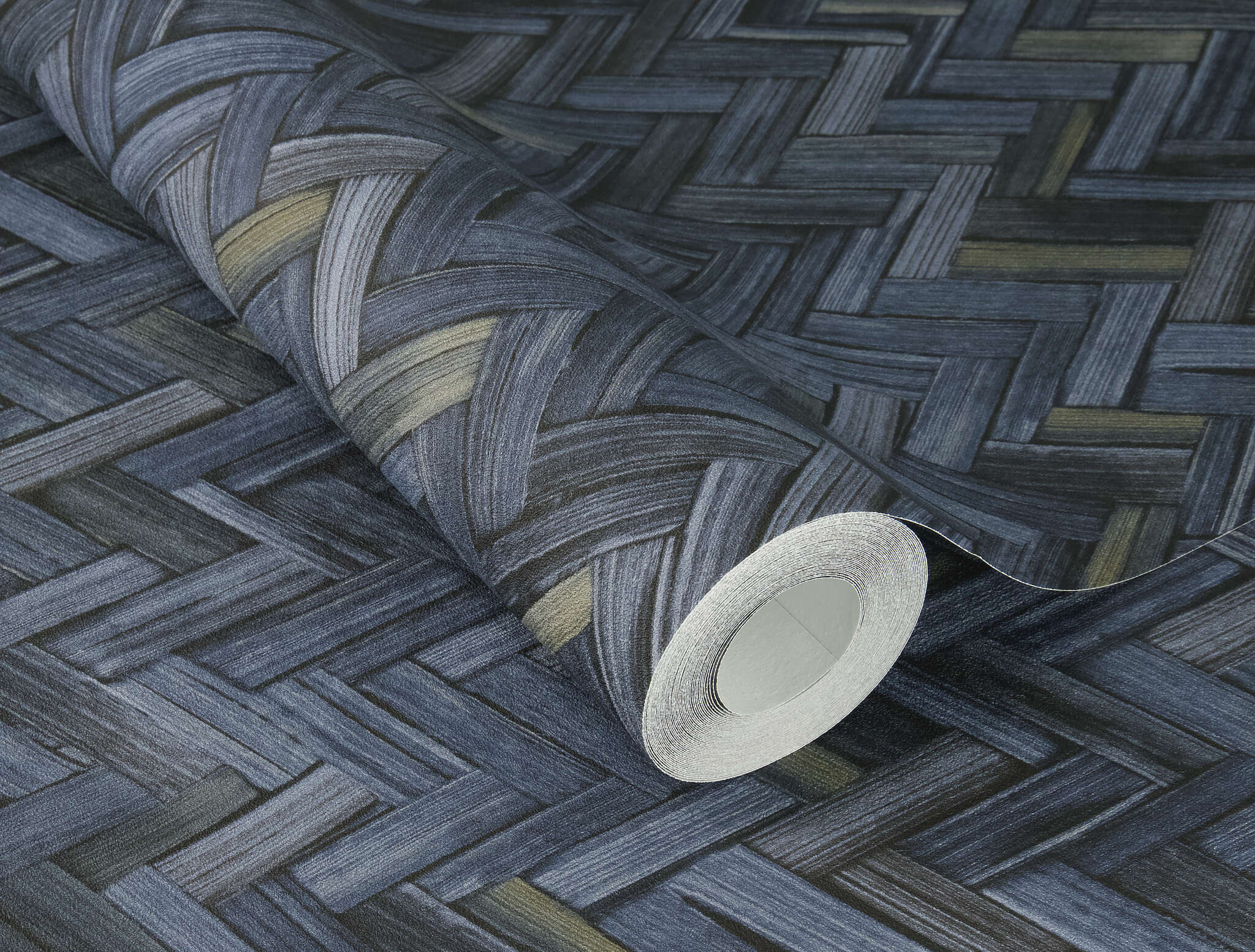10-410389 Detailaufnahmen 1 Detailed image of Non-woven wallpaper with a bamboo texture in rich dark blue – decorative and expressive in a herringbone design.