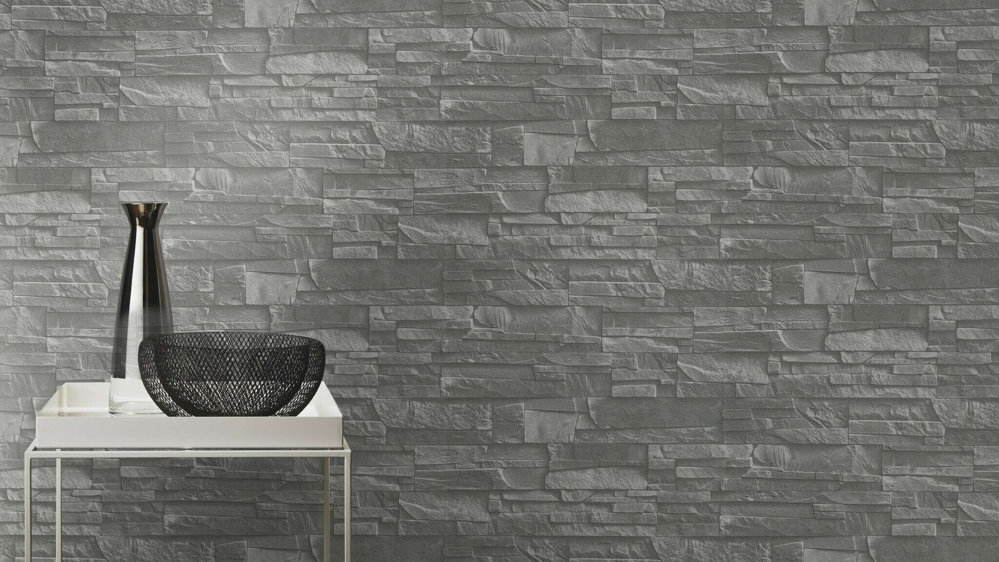 10-475029 Raumsituationen 2 Room with Realistic non-woven wallpaper in a slate stone look with a textured surface in shades of grey with a real 3D look