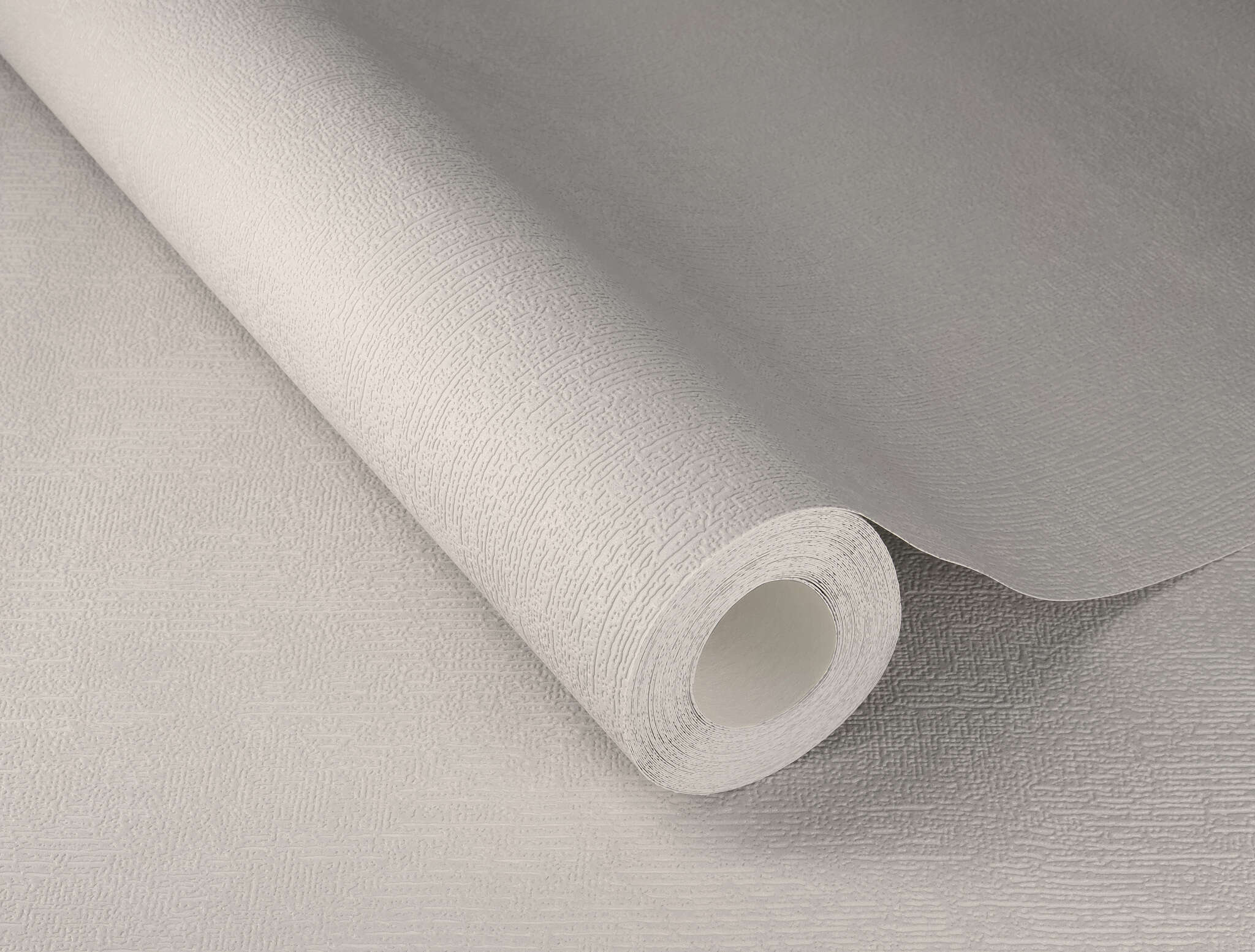 10-415360 Detailaufnahmen 1 Detailed image of Plain non-woven wallpaper in delicate rose with a matt, smooth surface.
