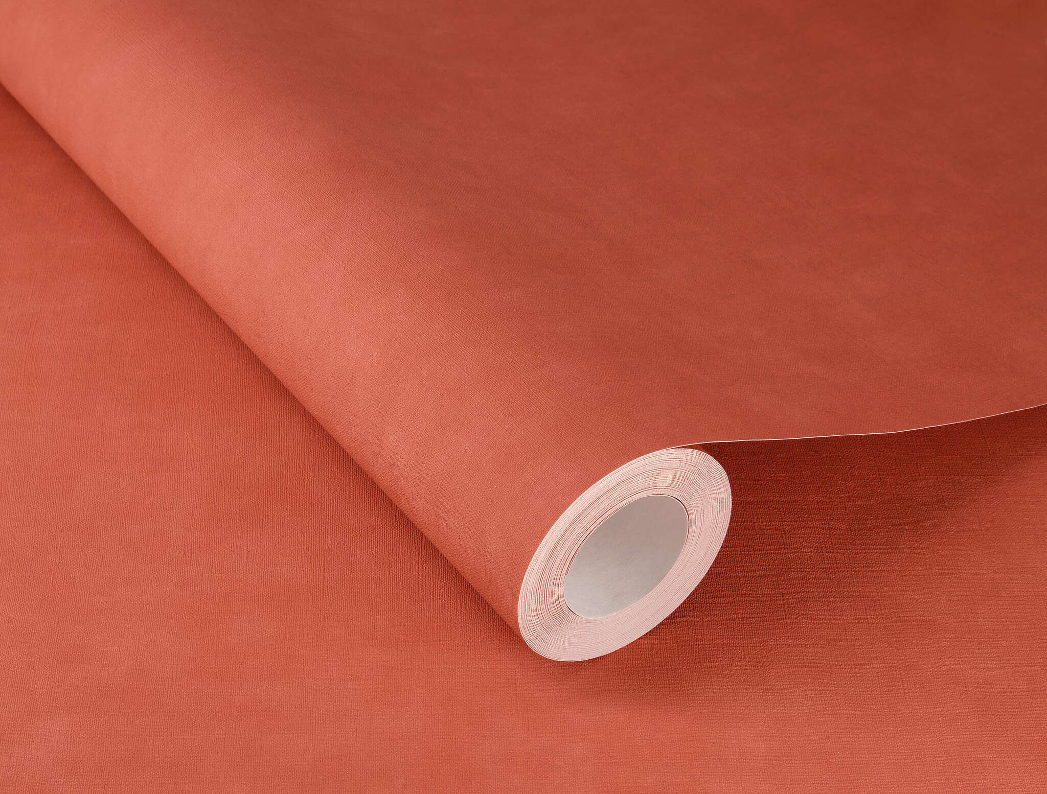 10-330113 Detailaufnahmen 1 Detailed image of Wallpaper in warm terracotta with a soft woven texture – natural, Mediterranean and cosy.
