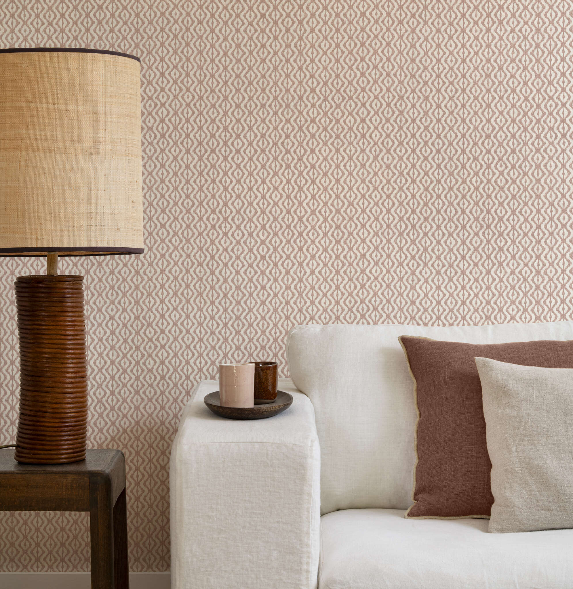 10-410662 Raumbilder 1 Room with Non-woven wallpaper with a small diamond pattern in terracotta and white with a textile-like texture.